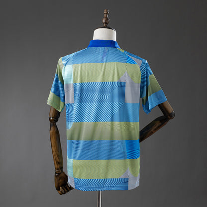 Real Madrid 25-26 POLO - Green Striped Tray detail